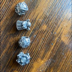 4 Pandora charms. Sold as a group. Used.
